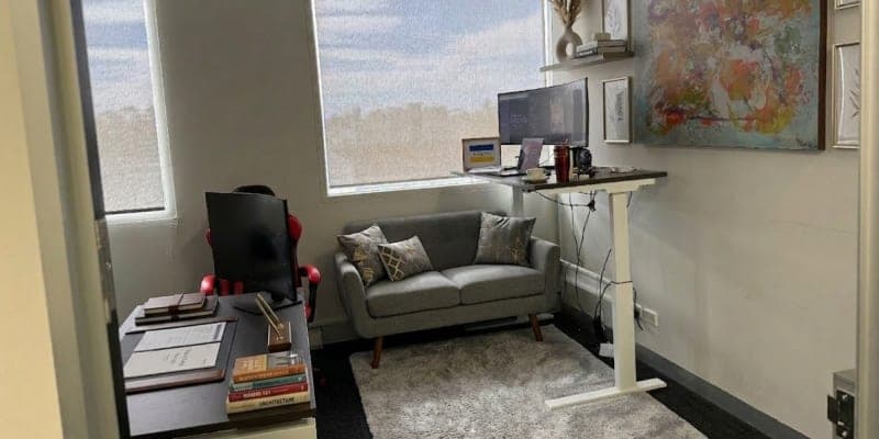 Open office environment surrounding meeting areas with flexible workspace seating